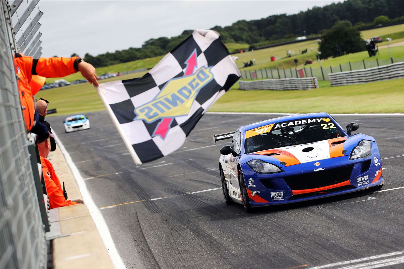 Toby Trice takes the flag at Snetterton Picture: Jakob Ebrey