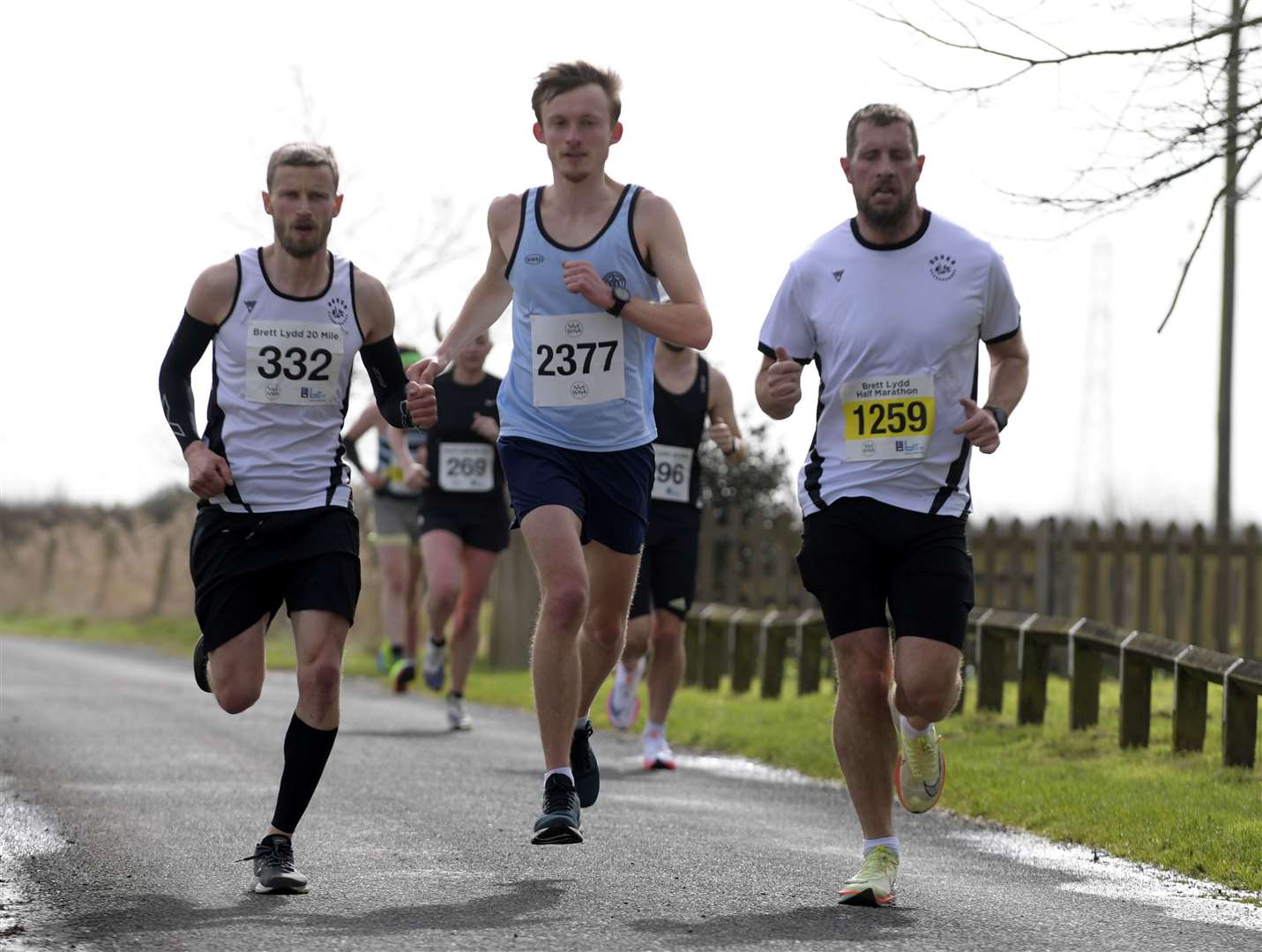 No.332 Jared Dobson of Dover Road Runners with No.2377 Ross May of Cambridge Harriers and No.1259 Philip Sluman, also of Dover Road Runners. Picture: Barry Goodwin (62961896)