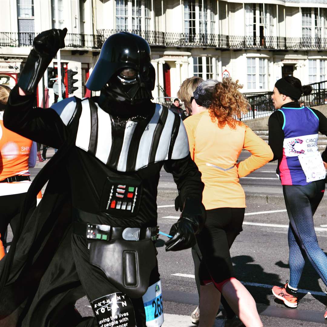 Philip Powell has practiced running in the Darth Vader costume at half marathons.