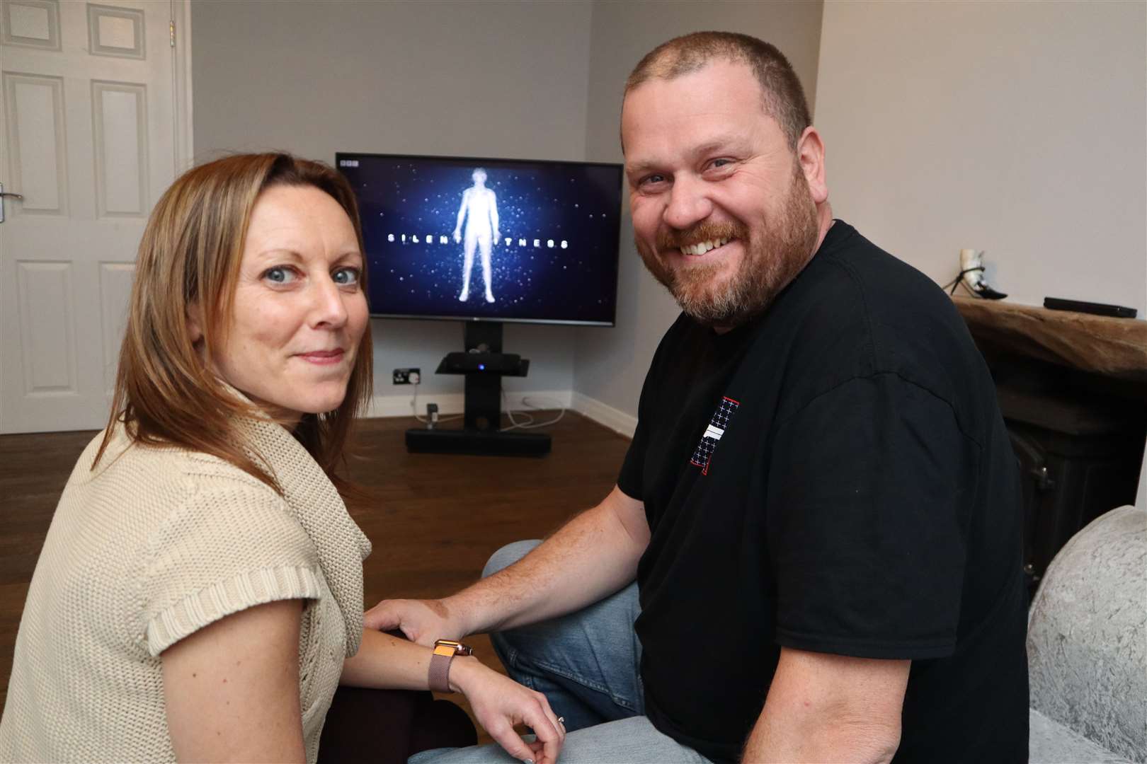 Mike and Sarah Fendt tuning in to watch Silent Witness after the BBC TV crew hired their home on The Leas at Minster to shoot scenes. Picture: John Nurden