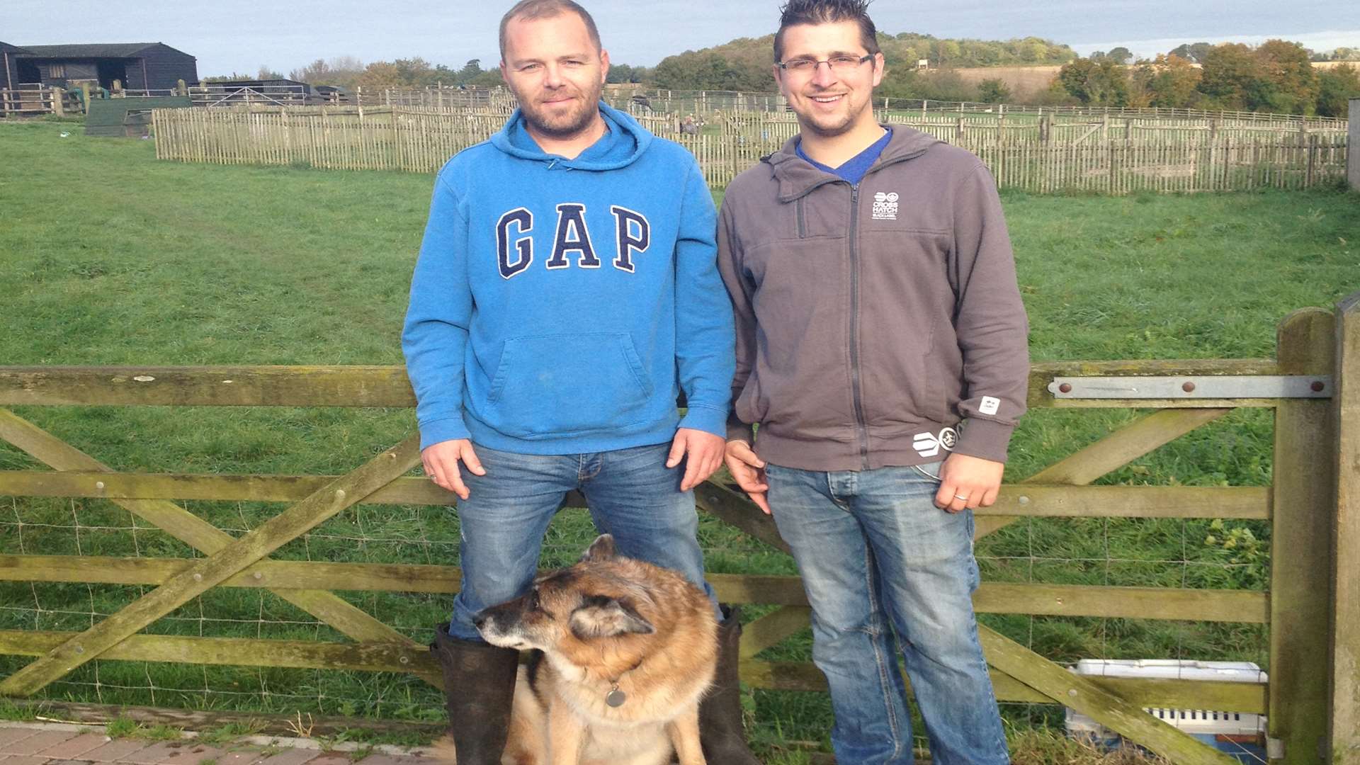 Terry Kemp and Chris Johns with dog Kym, age 15 who lives at the charity Happy Endings