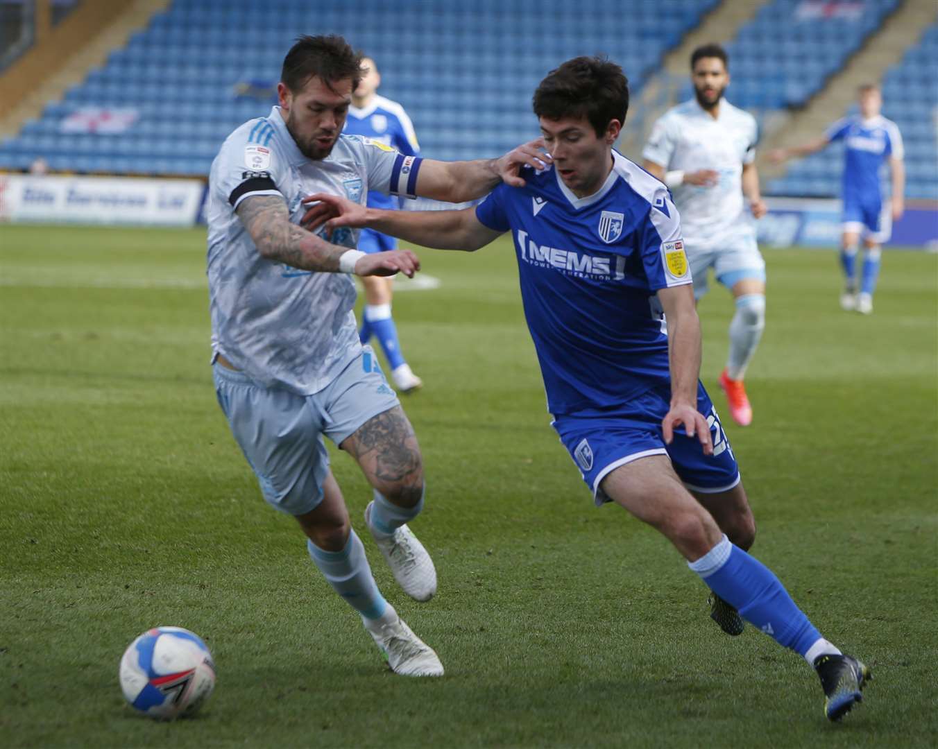Tom O'Connor holds off Ipswich captain Luke Chambers. Picture: Andy Jones