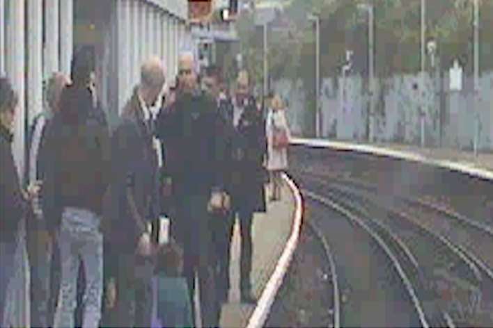 Shocked commuters on the platform after a fellow passenger was nearly run over by a train. Picture: Southeastern