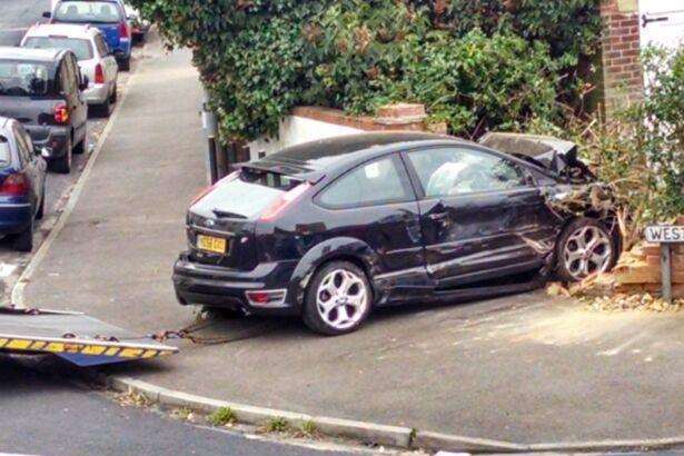 The Ford Focus which ploughed through a wall and hit a house