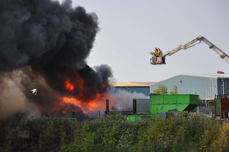 Fire crews tackle the blaze at the Sweeep Kuusakoski recycling plant. Picture: Andy Ives