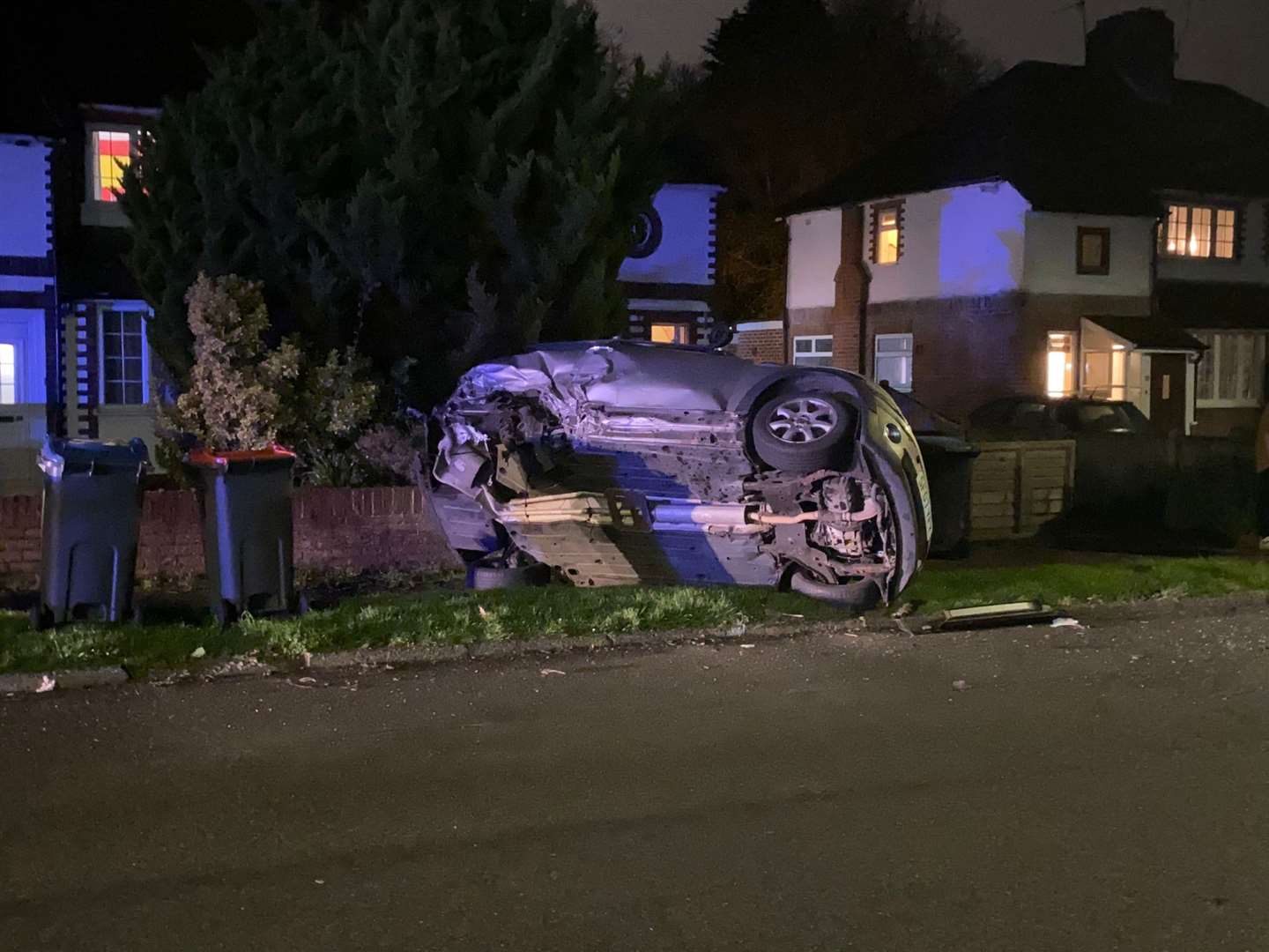 A car was seen overturned on the residential street