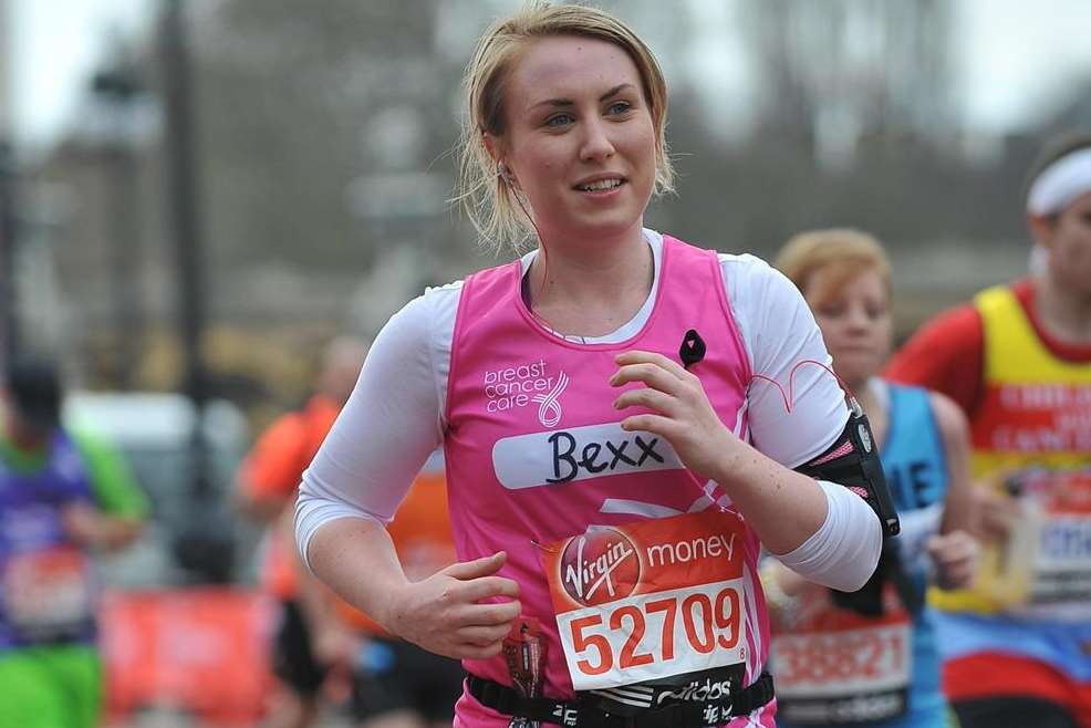 Rebecca running the 2013 Virgin London Marathon.