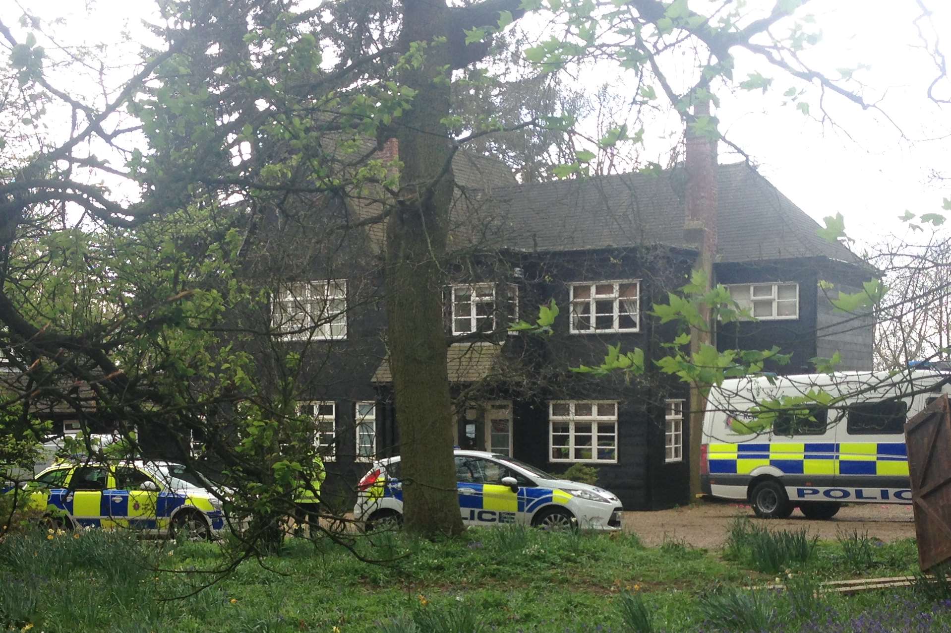 Police vehicles at Peaches Geldof's house after her death. Picture: Kiran Kaur