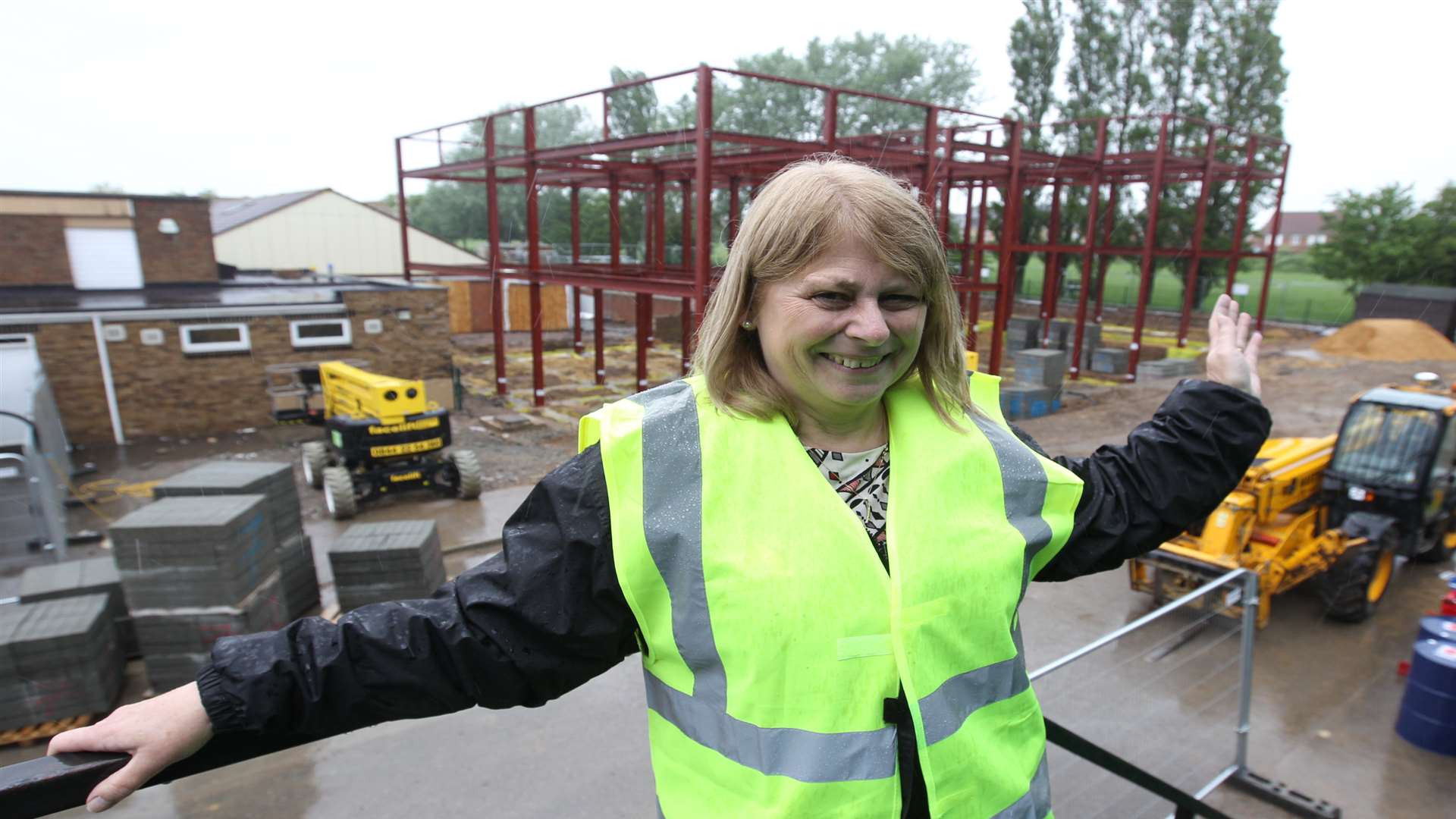 Caroline Mariner, Head of School at Iwade Primary School pointing to the new extension of the school