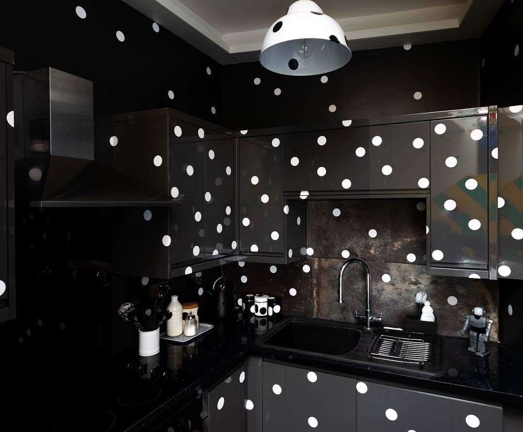 A black and white spotty kitchen is one of the stand-out rooms in the flat. Picture: Ollie Harrop