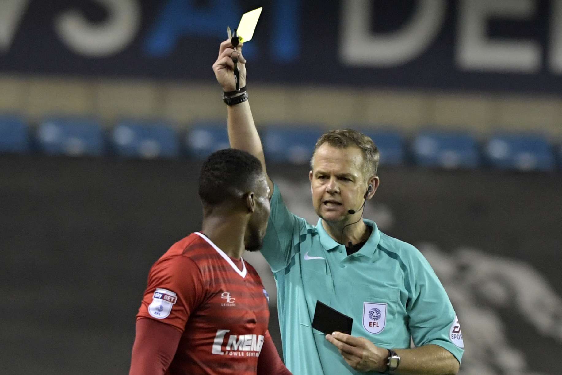 Ryan Jackson receives a yellow card Picture: Barry Goodwin