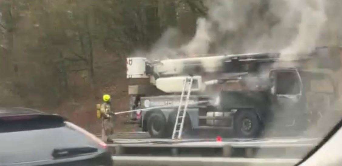 Firefighters battled to put out a large vehicle fire on the M20