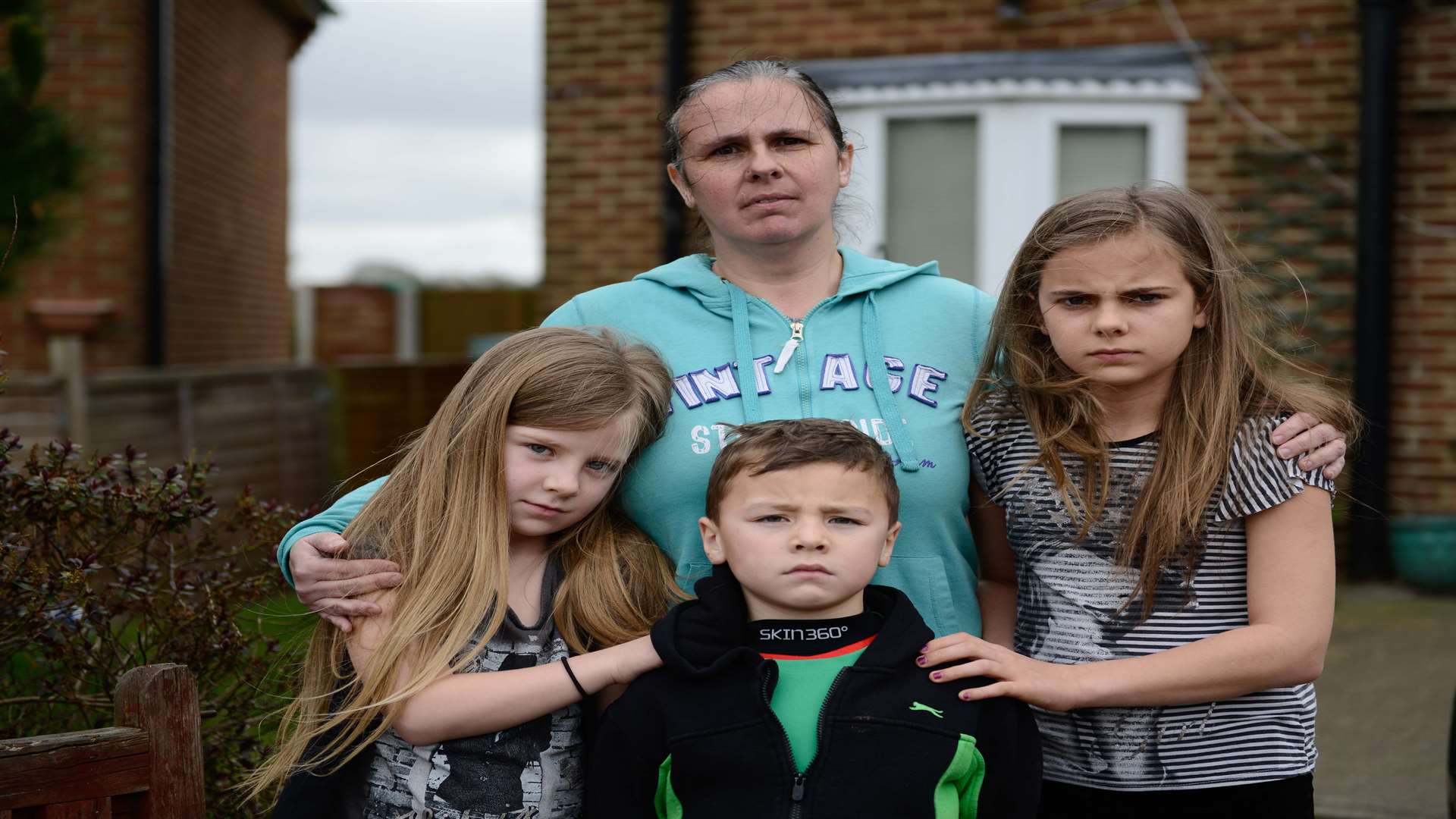 Mum Vanessa Reeve with her children Rebecca, 13, Charlotte, 9, and Louis, 7. Picture: Roger Charles