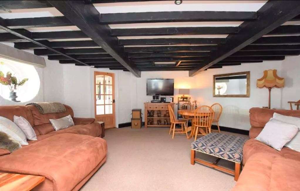There are three bedrooms and a lounge in the windmill itself