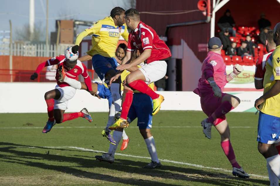 Anthony Acheampong, left, heads in the third (Pic: Andy Payton)