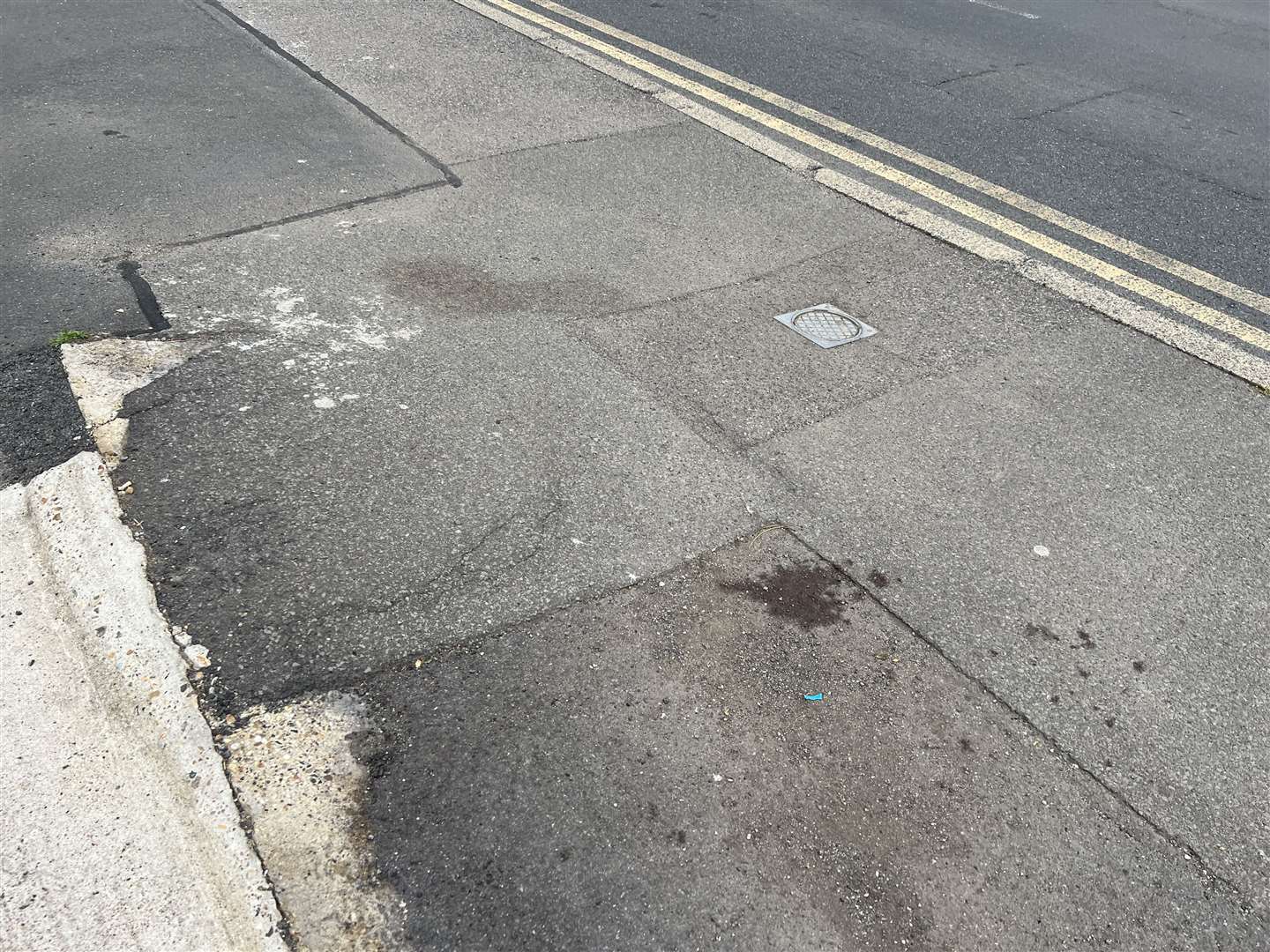 The dried blood on the pavement after Andy Anderson's fall. Picture: Megan Carr