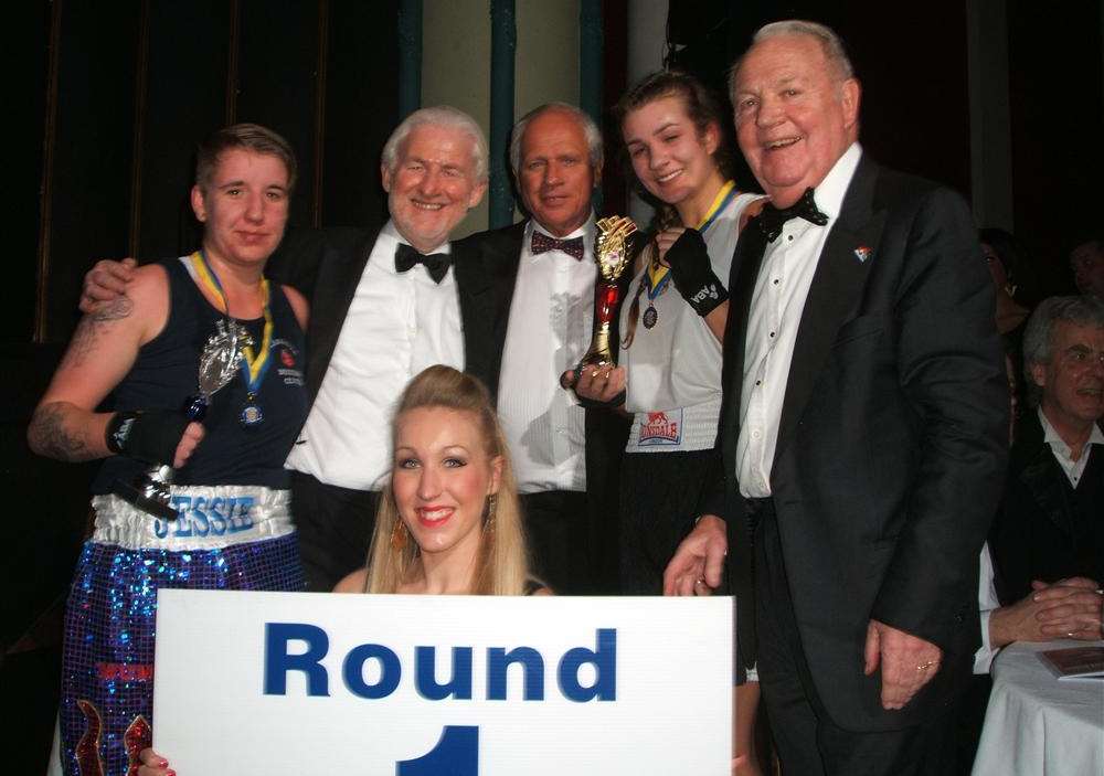 Female boxers Grete Barzdentye ( Canterbury Christ Church University) and Jessica Tanock (Margate Boxing Club) with organisers at the Rotary Club of Thanet's 9th annual boxing gala, including from left club president Neal Elliott, Les Ray, ring lady Jasmin (front) and Frank Thorley.