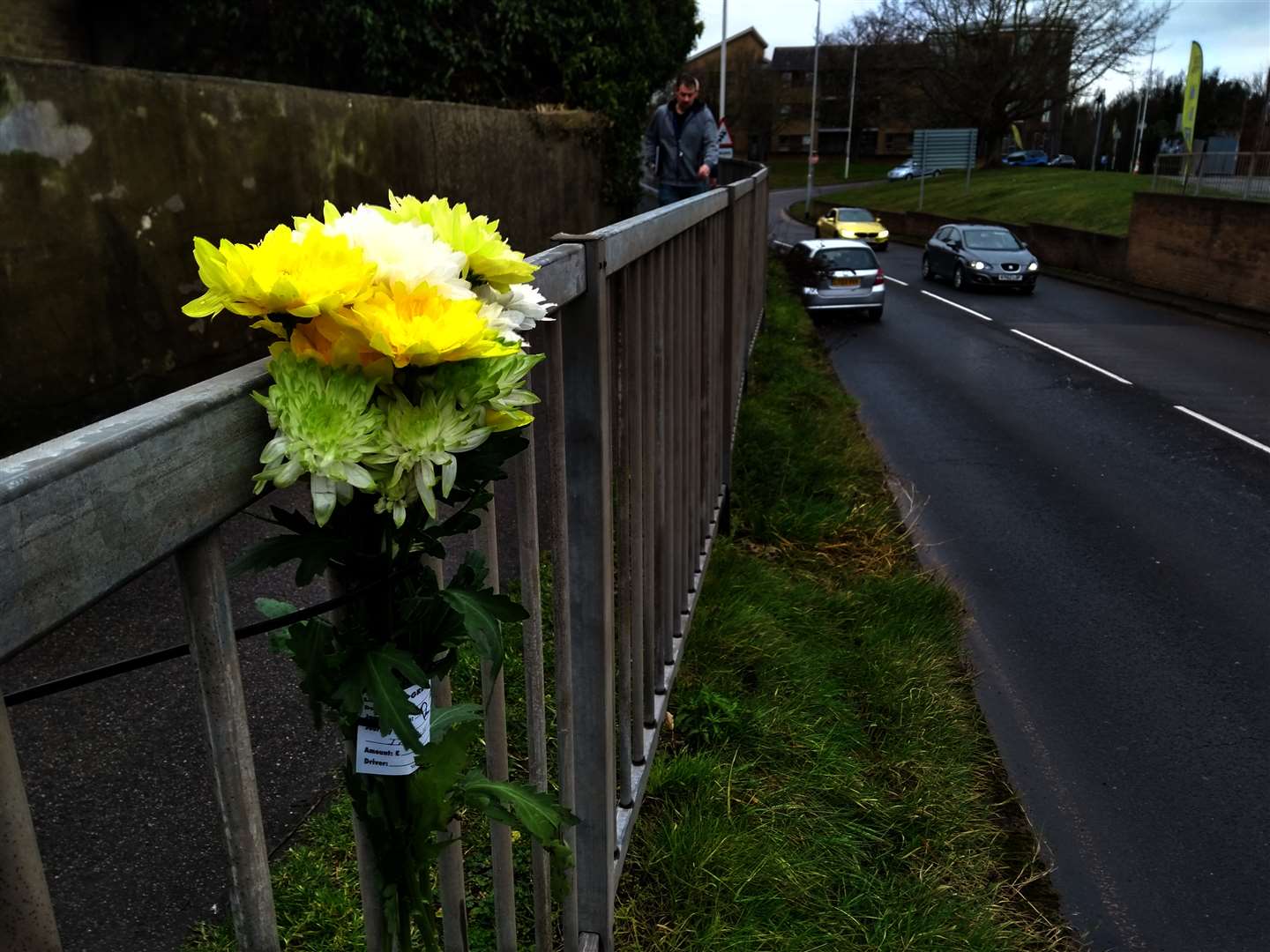 Flowers have been placed at the scene where a Mr Field was killed after being hit by a lorry.
