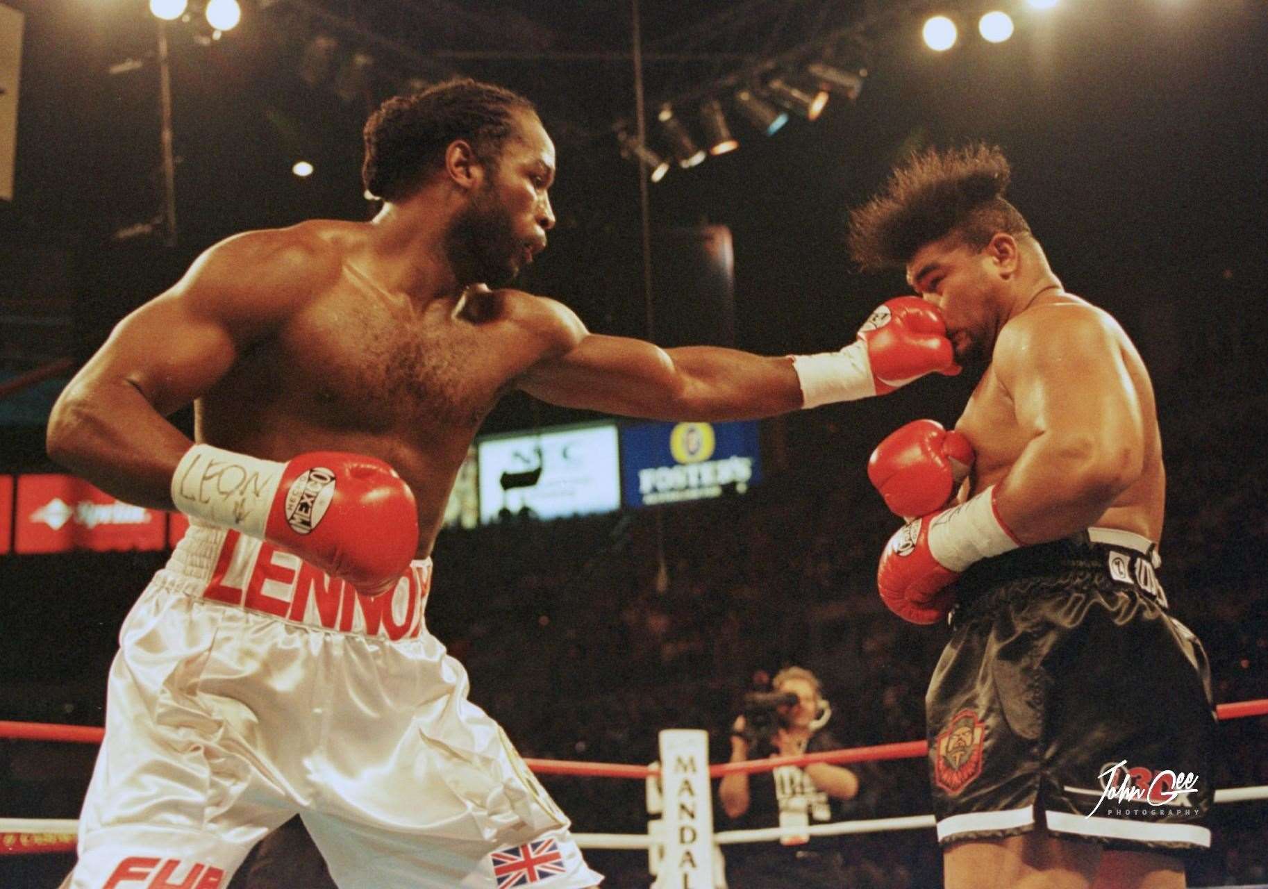 John was in Las Vegas in 2000 as Lennox Lewis beat David Tua on points Pic: John Gichigi/Getty Images