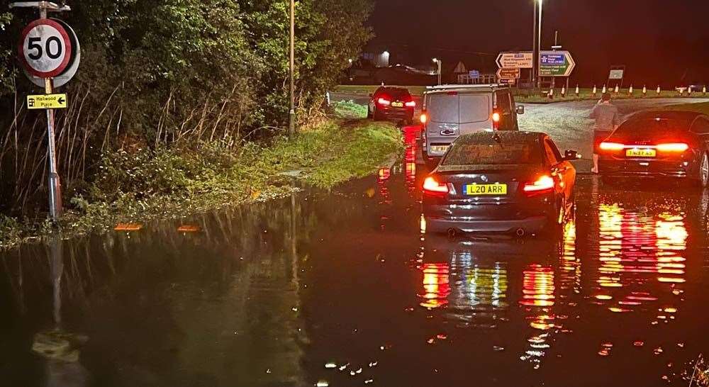 Drivers were stranded after torrential rain flooded the M26 at Wrotham last night. Photo: UKNIP