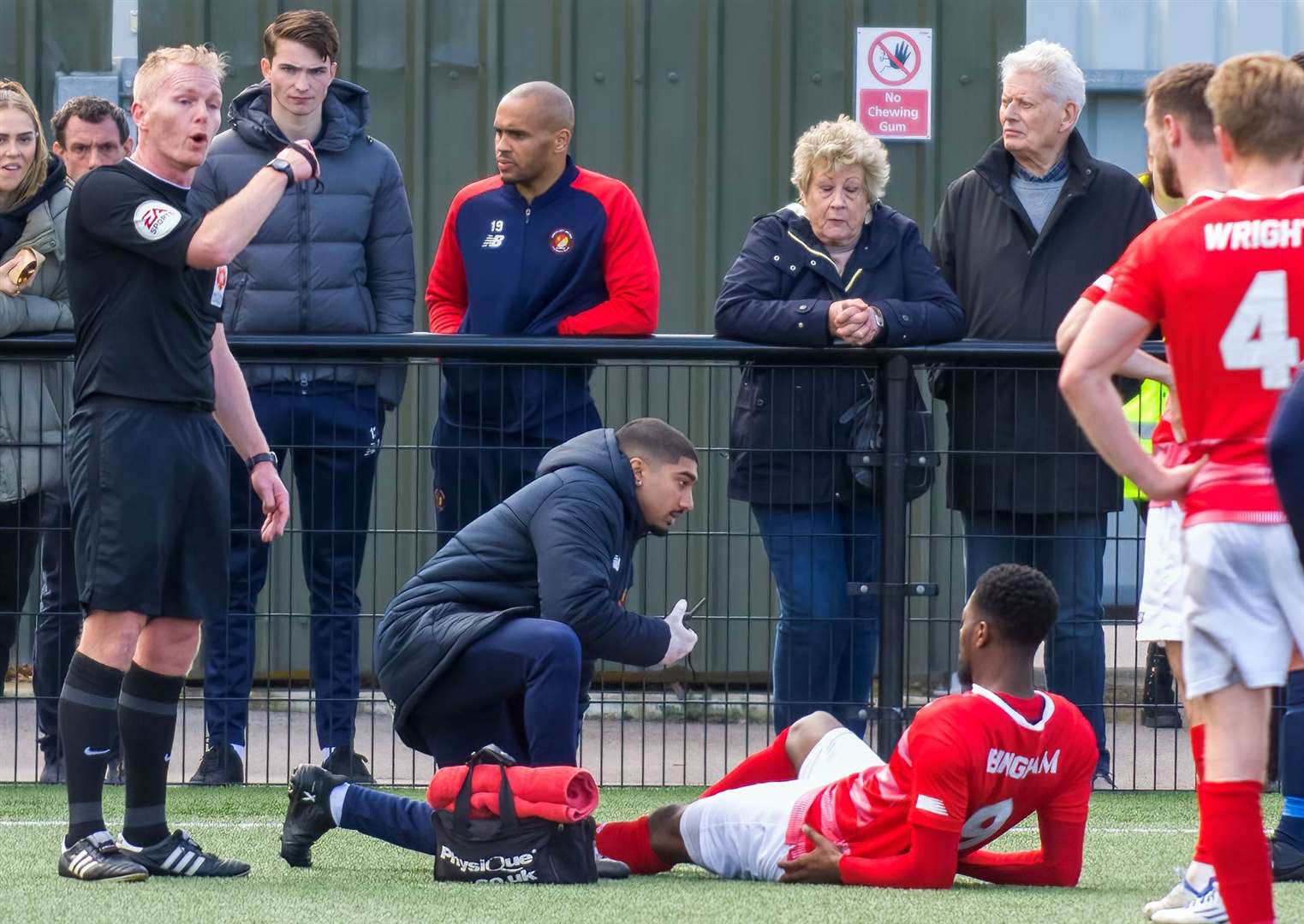 Rakish Bingham receives medical attention after rupturing his Achilles at Slough. Picture: Ed Miller/EUFC