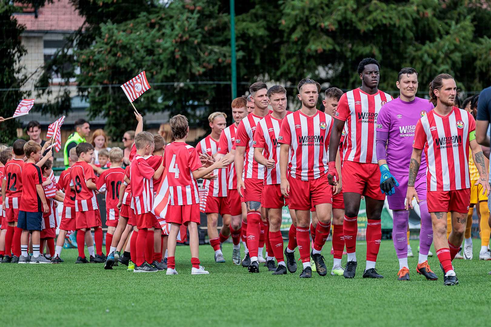 Steyning players are welcomed on to the pitch before taking on Maidstone. Picture: Helen Cooper