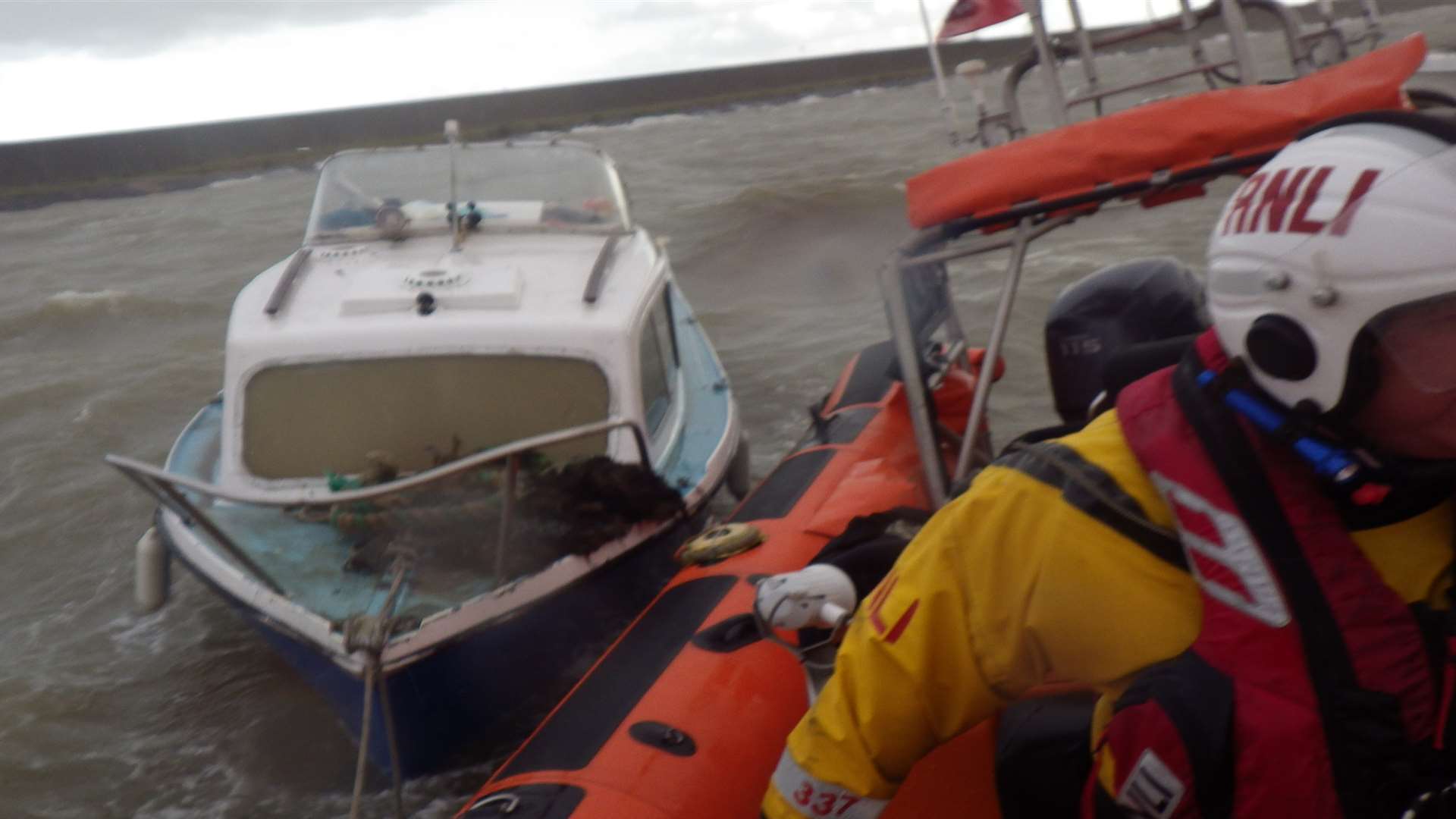 The vessel secured by the tow line to the RNLI launch. Picture: RNLI/Alan Carr