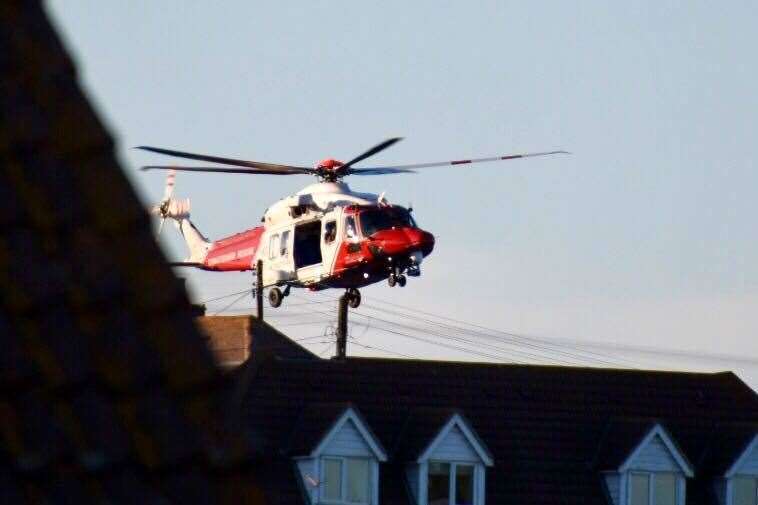 The coastguard helicopter over Warden last night. Picture: Lesley Bristow