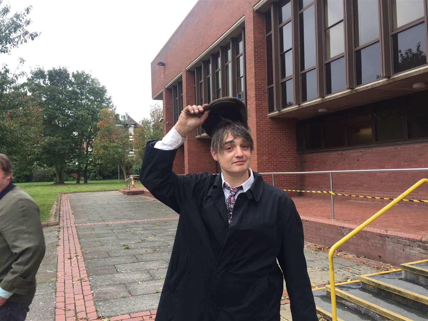 Pete Doherty doffed his hat outside Folkestone Magistrates' Court after being banned from driving three years ago