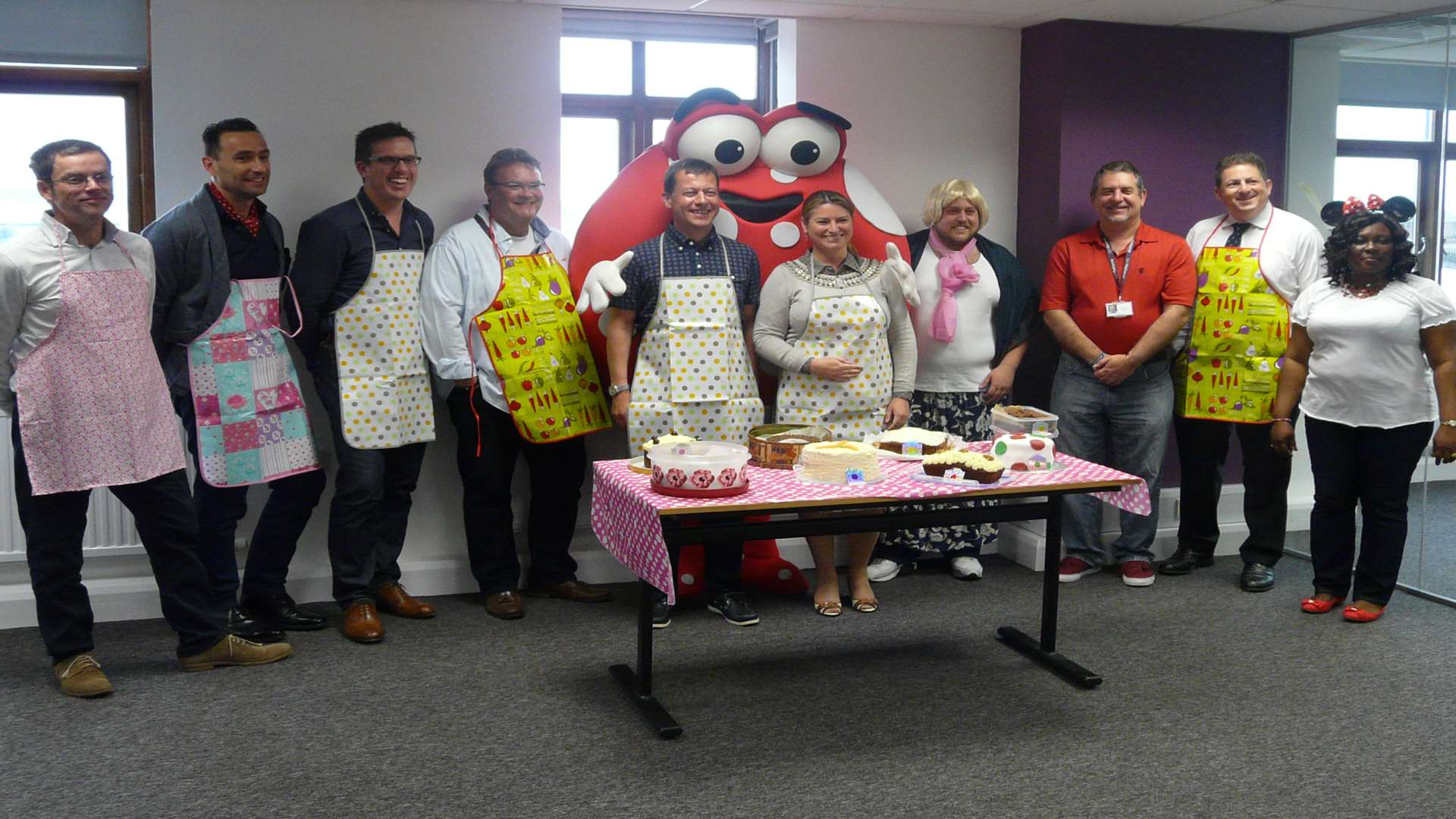 The executive team at Kent Reliance in a bake off for Demelza Hospice Care for Children