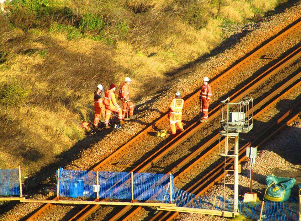 Workmen inspect a section of the track. Picture: Samphire Hoe