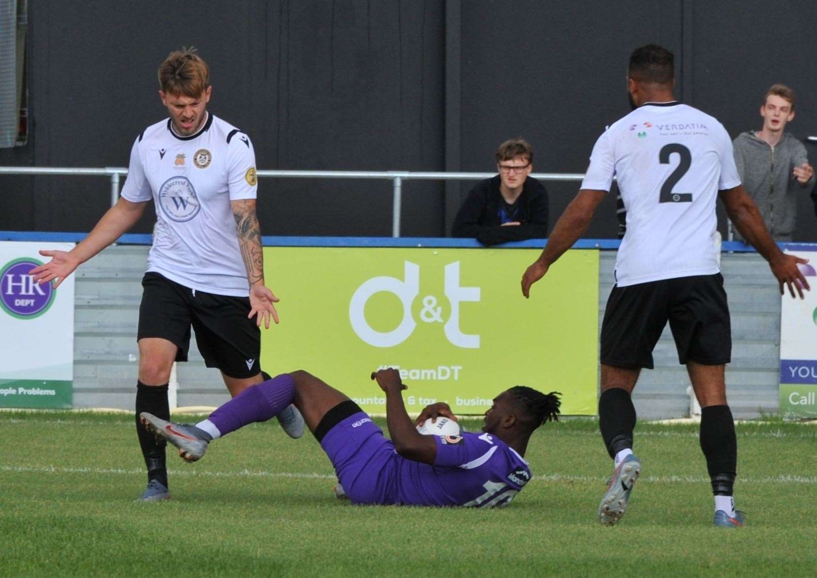 Ibrahim Olutade is taken down for Maidstone's late penalty at Hungerford Picture: Steve Terrell