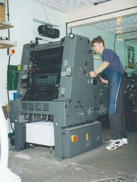 Paul running the firm's first machine used for CMYK printing
