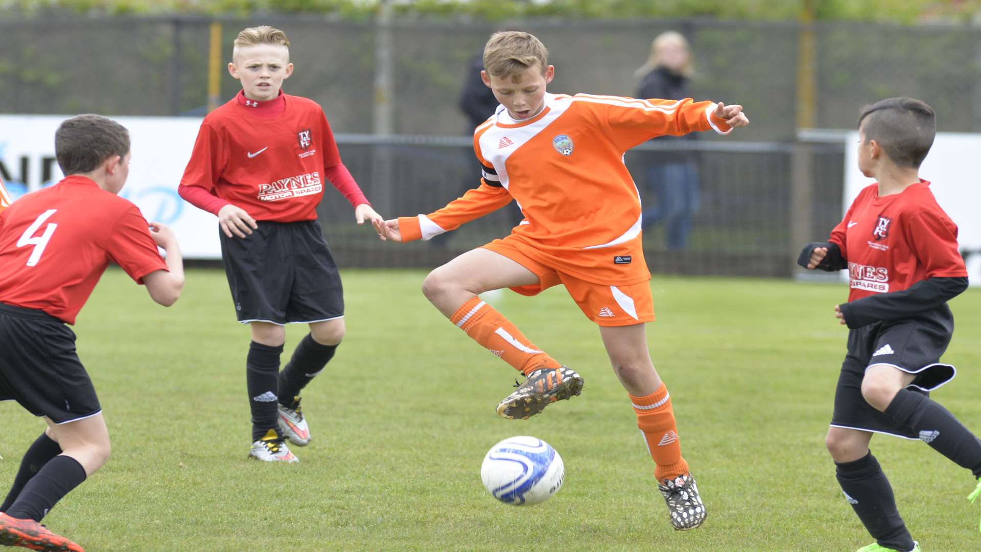 Cuxton 91 (orange) on the ball against Thamesview Youth with the Under-11 League Cup at stake Picture: Ruth Cuerden