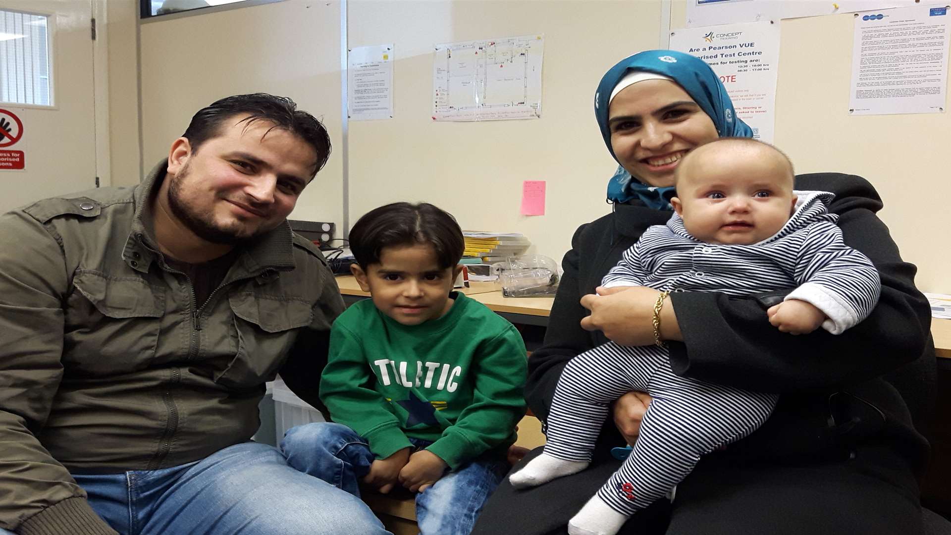 Syrian refugees Ismaeil Ismaeil with his son Rida, and his wife Jamila Nabolsi with her baby son Rital