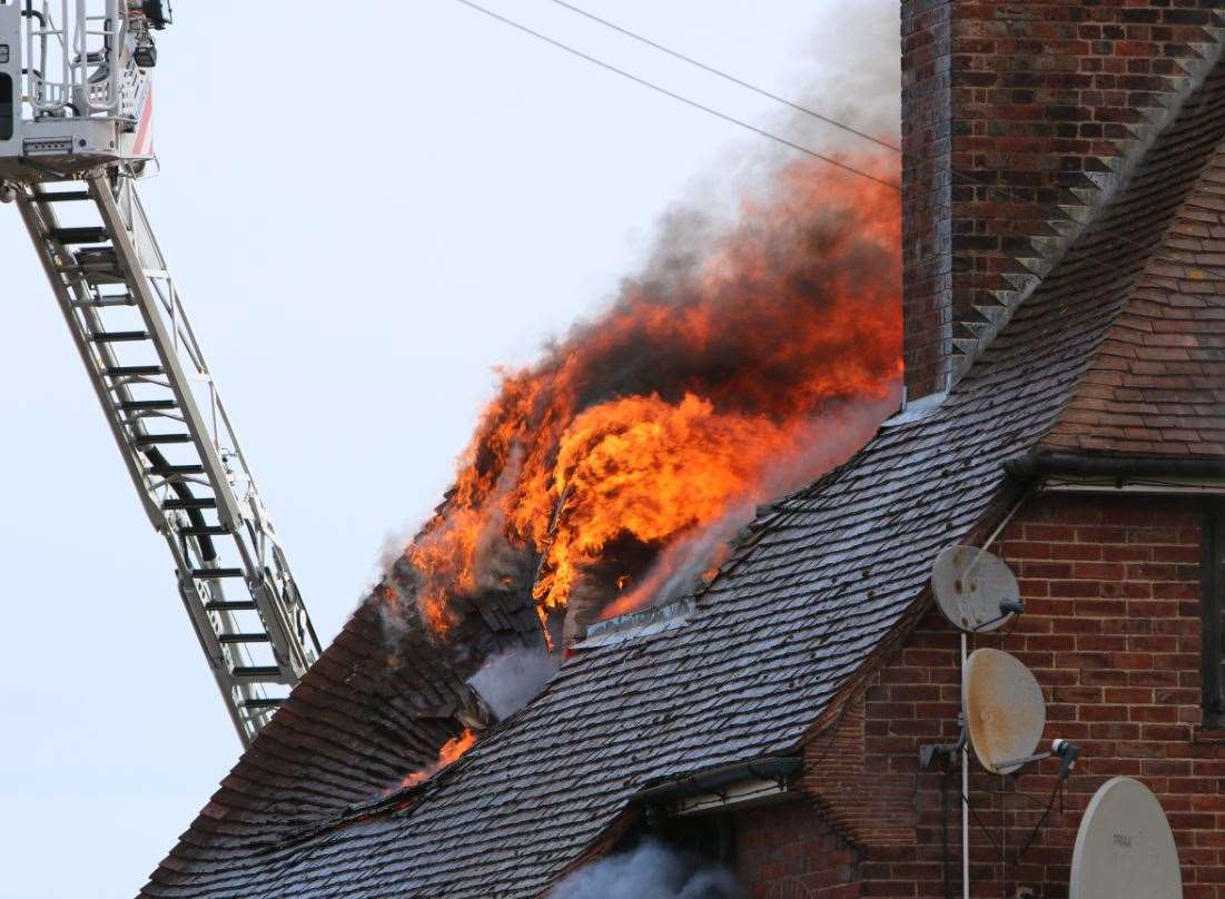 The flames in the roof. Picture: Daisy Read