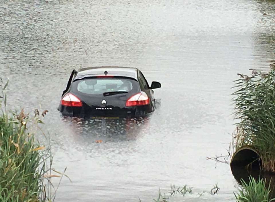 A Renault Megane was spotted immersed in the lake in Mote Park, Maidstone this morning. Picture: Richard Bance