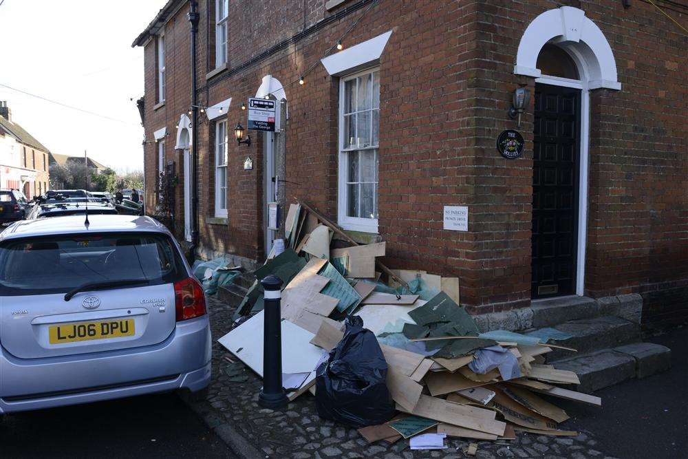 The clear-up begins in Yalding
