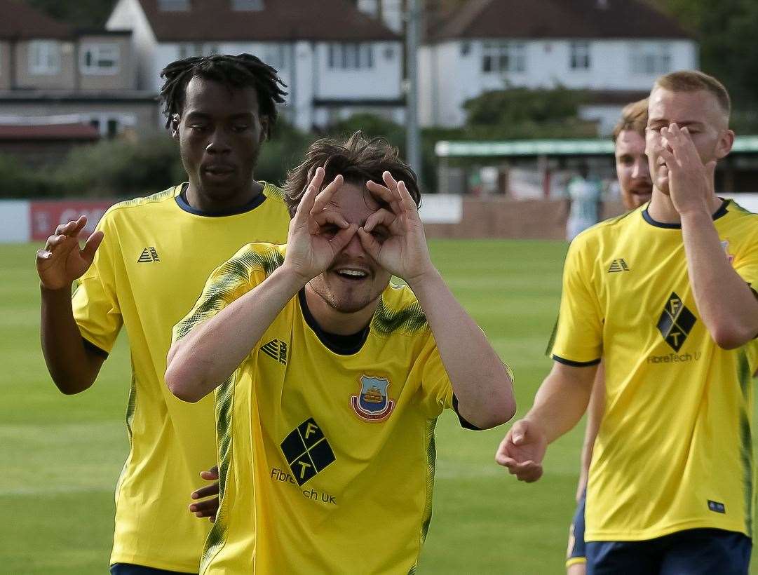 Liam Gillies celebrates scoring the second goal in Whitstable’s FA Cup win at VCD last Saturday. He’s eyeing double figures in goals and assists this season. Picture: Les Biggs
