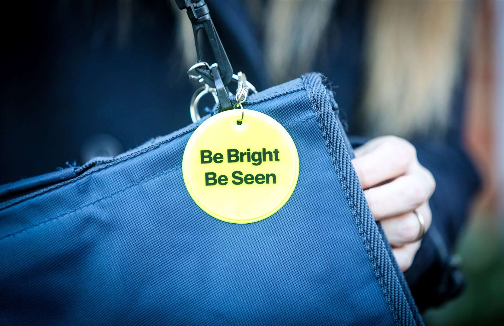 Keyrings can be attached to bags or coats to help children remain visible