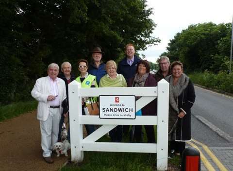 Volunteers at the new gateways in Sandwich ahead of the 7.5 tonne weight restriction that will come into force today