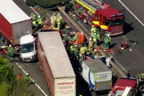 Rescuers working through the wreckage on the M26. Picture: ITV News
