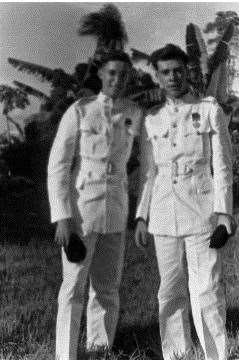 Robin Kenworthy, right, with a pal in ceremonial whites