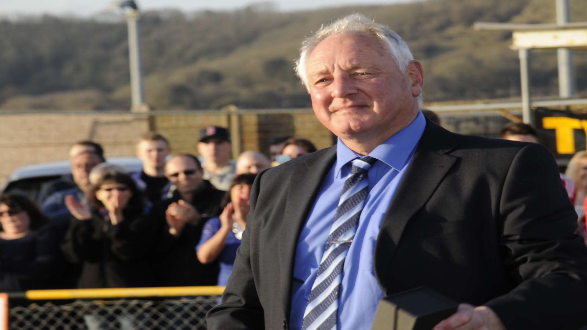 Neil Cugley walks forward to receive his championship medal Picture: Gary Browne