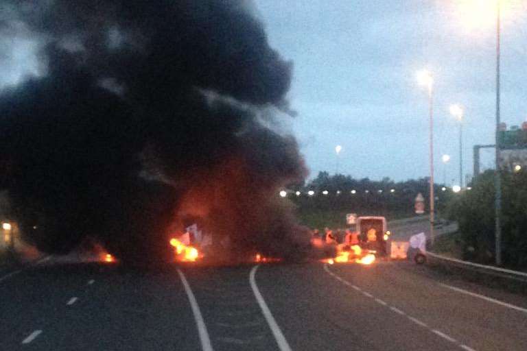 Protesters outside the Calais port yesterday morning. Picture: @chriscary180605