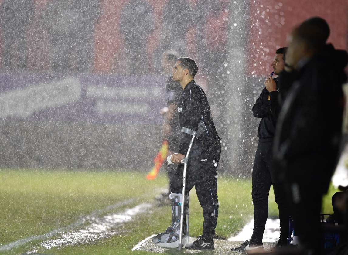 Welling boss Loui Fazakerley watches on in the rain. Picture: Keith Gillard