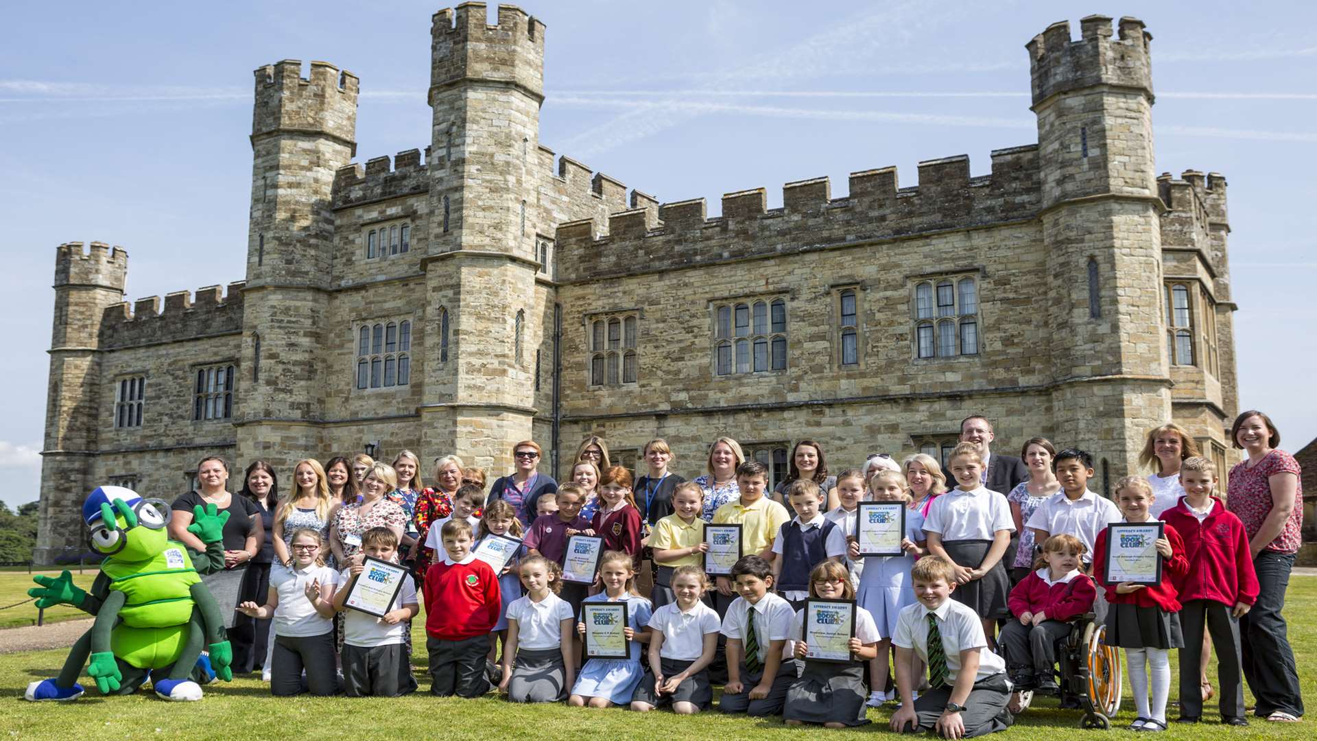 Buster Bug celebrates youngsters getting the reading bug. Pictured here with the winners and sponsors of the Kent Literacy Awards in June at Leeds Castle.