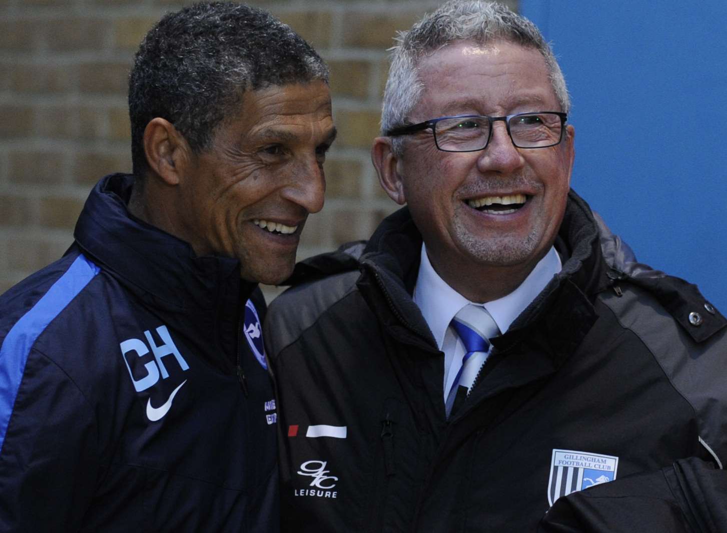 Brighton manager Chris Hughton with Gillingham chairman Paul Scally Picture: Barry Goodwin