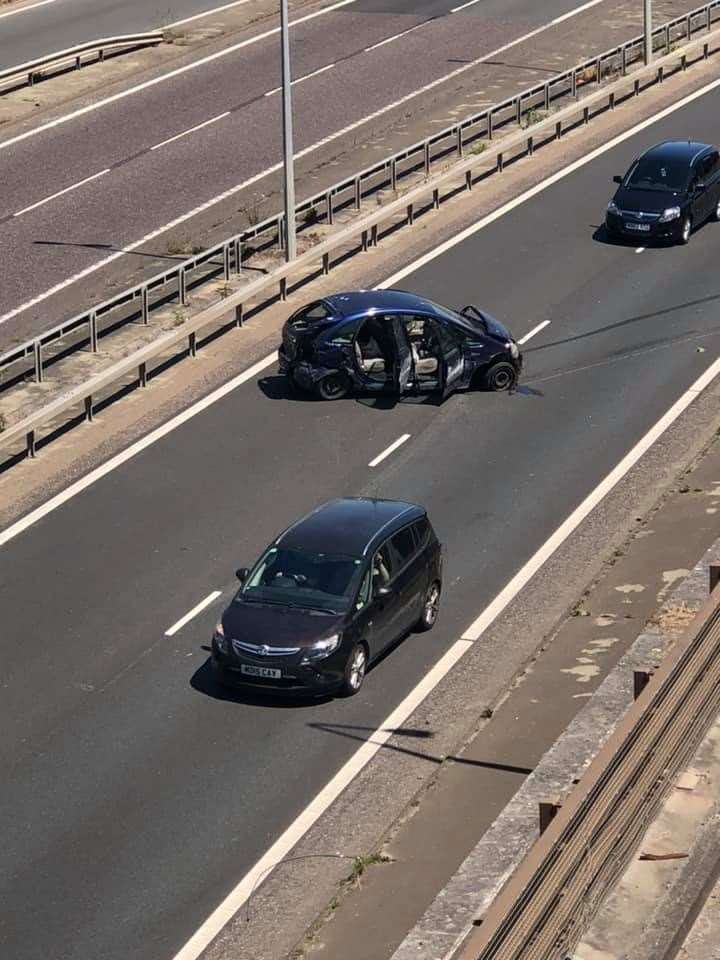 At least one car is stuck in the carriageway following the crash. Picture: Ryan Walters/ UKNIP