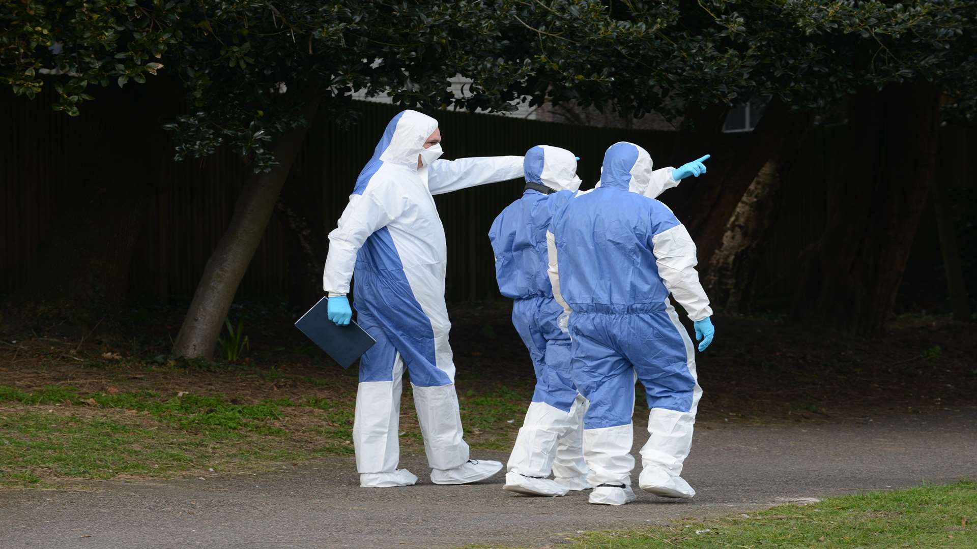 A forensic team searches the park. Picture: Gary Browne